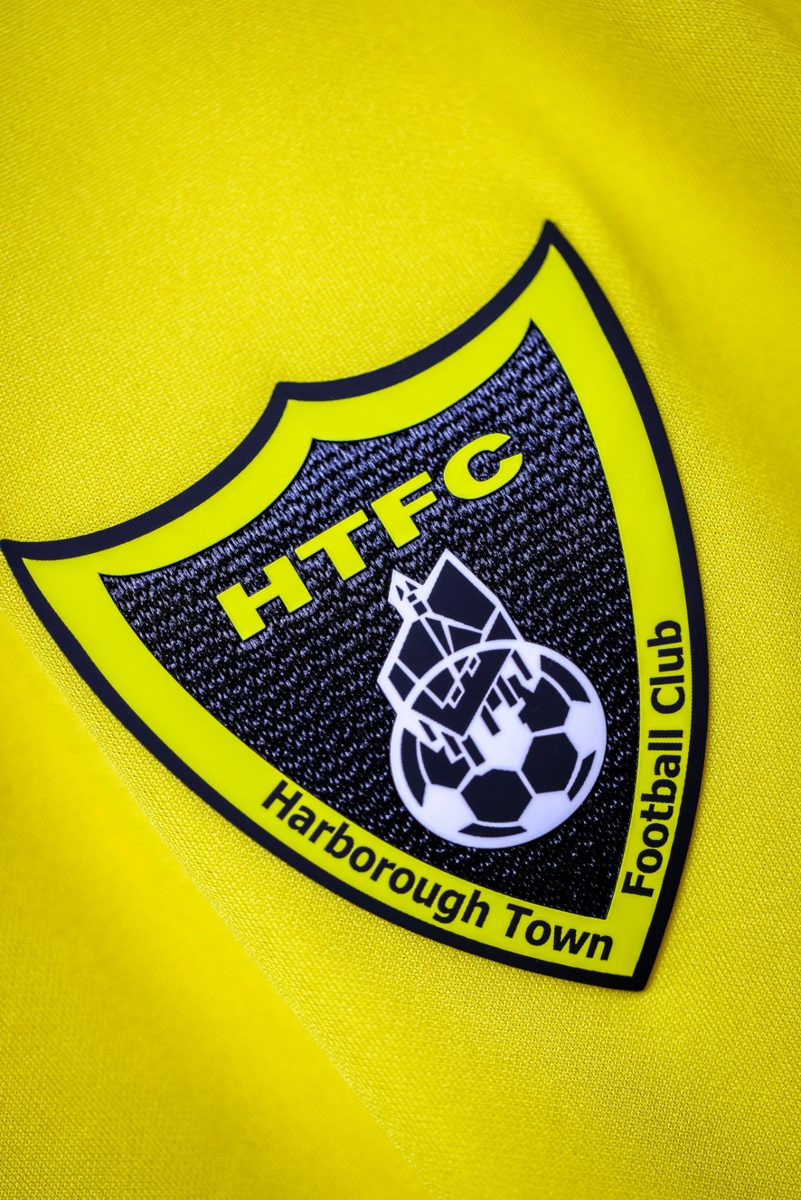 Close-up of the embroidered Harborough Town crest